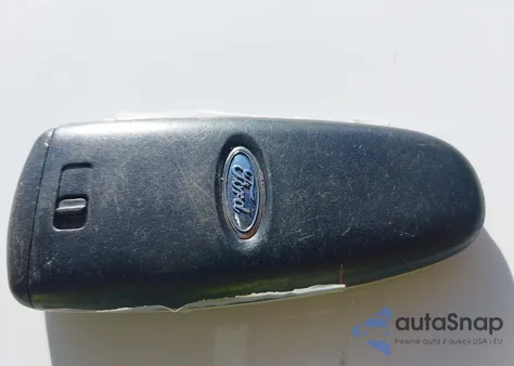 2015 Ford Focus Titanium from USA, damaged, VIN 1FADP3J27FL259029